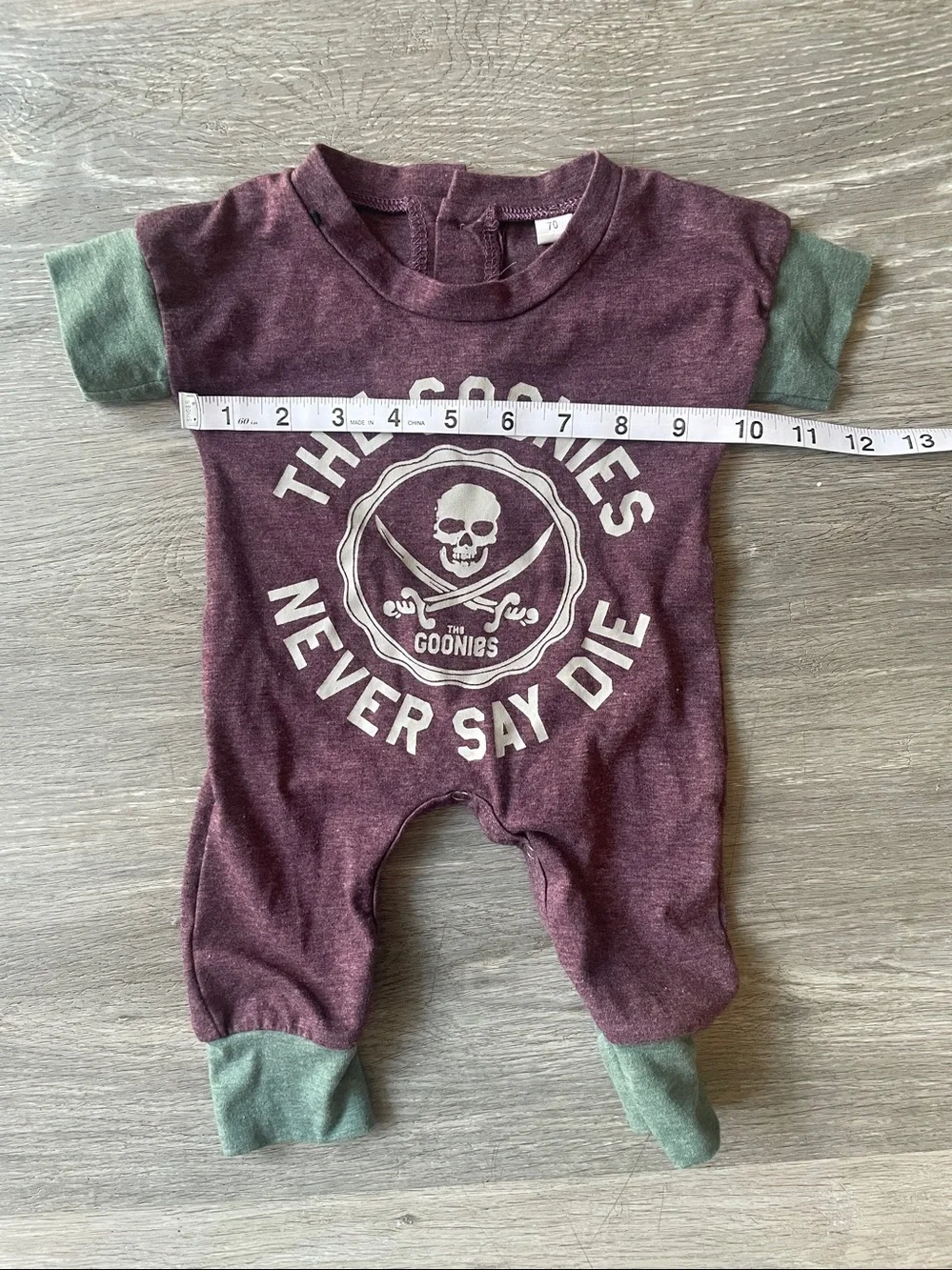 The Goonies purple baby onesie